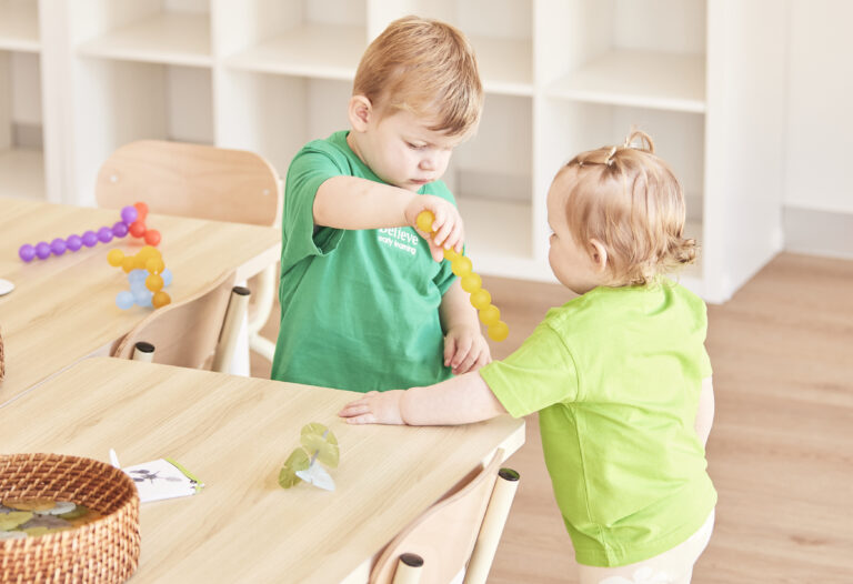Two children playing at Believe Early Learning Mooroopna, engaging in teamwork and discovery.